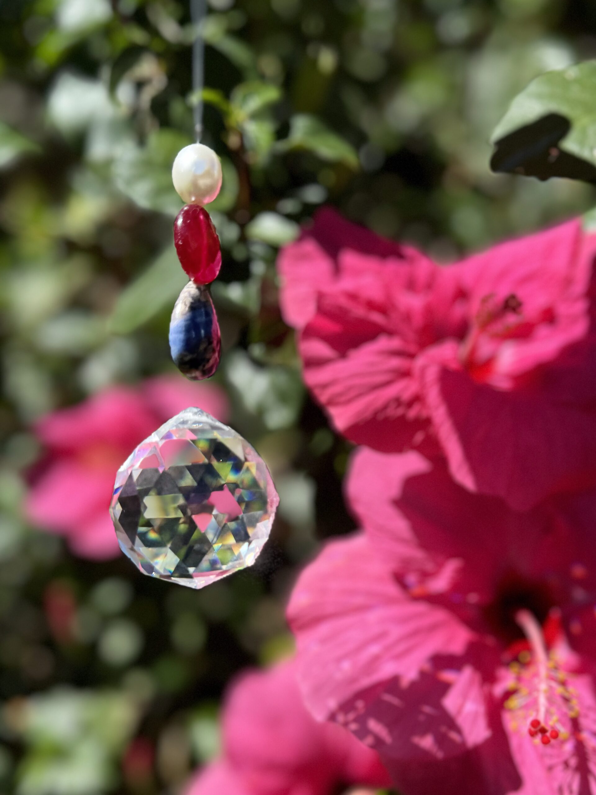 Pendant by Elena Kalistova, with Chögyal Namkhai Norbu's beads